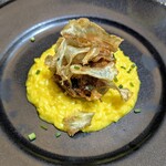 メロディア - サフランリゾット オーソボッコの煮込みとアーティチョーク グレモラータ 