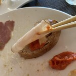 リストランテ プレーゴ - 自家製パンにハムを乗せて食べても美味い