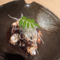 個室と地肴 北新地 心屋 本通り店 - タコの黒胡椒炒め