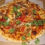 WOLFGANG PUCK Express - 2014年のカルアポークピザ＄13.00