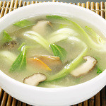 Matsutake mushroom and greens soup