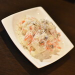 ワインバー バッカス - マヨネーズを使わない、いぶりガッコ入りポテトサラダ（９５０円）２０２５年７月