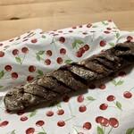 パンやきどころ RIKI - ショコラノアバトン ブラッドオレンジとマロングラッセを包んで ¥420