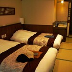 湯回廊 菊屋 - 落ち着いた寝室