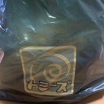 トミーズ - ニョロゾのお腹みたいなロゴマーク。