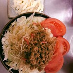 海鮮もんじゃ 片岡 - トマトもんじゃ+ひき肉+チーズ  イタリアン風でヘルシーなもんじゃです。  これにカレーをプラスするとこれもまた美味しいですよ。
