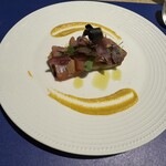 ガーデンキッチン かるめら - 焼きナスの上に瞬間燻製のマグロ　レモン風味