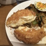 310396745 - 粗めの衣がサクッと。ベシャメルソースが濃厚でとても美味しいです。