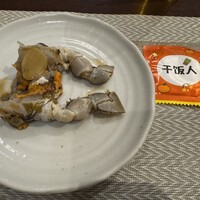 上海料理 四季陸氏厨房 - ワタリガリ紹興酒漬けとビニール手袋の入った袋