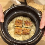310885065 - 牛蒡の炊き込みご飯に鰻を乗せて