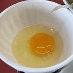ラーメン もっけだの - 『朝食 ラーメンニンニク野菜マシマシ＋メンマ』の生卵