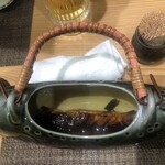 魚料理・もつ鍋  山咲き - ヤマメ酒。ヤマメの風味が効いていました。
