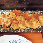 酒肴商店 アジト - 蓮根カリカリチーズ焼き