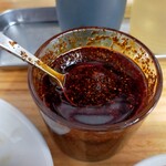 香蘭 宇都宮駅西口店 - 自家製胡麻辣油　ドロっとした具をたっぷり投入