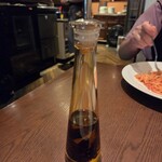 ポロとワイン - ペッパーオイルを試してみたくなった。