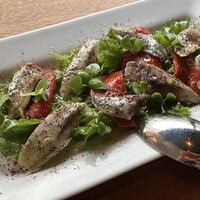 CICADA - House made sardine boquerones with frisee, piquillo