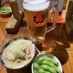 もつ焼 登運とん - ビール　モツ煮ハーフ