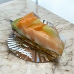 パティスリー・キュイール - 料理写真:オレンジとグリーンの2種のメロンタルト。どっちも甘いです。(๑'ڡ'๑)୨♡