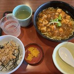 和風レストランまるまつ - 料理写真:マーボー麺（税込710円）とミニ鶏そぼろ丼（麺類との組み合わせで税込300円）