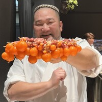 鳥かご - 笑顔で接客される加藤氏。