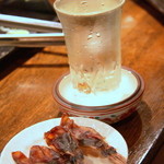 吽 - 日本酒には珍味が１品ついてくるのも嬉しいですね♪