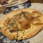 磯丸水産 - トルティーヤピザ