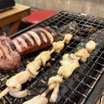 磯丸水産 - つぶ貝とイカ