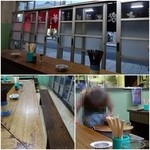 大衆酒場カネス - 使い込まれたテーブルとベンチシート/煮込みの大鍋