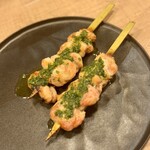 ワイン÷炭火焼き酒場cacco - せせりのエスカルゴバター焼き