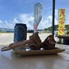 丸吉食品 - サザンスター＆カニもずく天ぷら越しの浜比嘉大橋