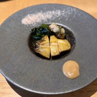 鉄板焼 天 本丸 - 活鮑の鉄板焼 ～肝ごとバター醤油で～