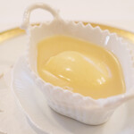 ポアブル - ランチコース　7370円 の新玉葱のフラン ジャガイモの温かいスープ