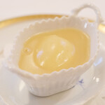 ポアブル - ランチコース　7370円 の新玉葱のフラン ジャガイモの温かいスープ