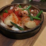 RIGOLETTO SMOKE GRILL & BAR - タコと菜の花、新じゃがのプランチャ