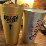 肉屋 金星 - 名物の金星サワーとビール。金星サワーはりんごの風味もあり、爽やかでおいしいです。