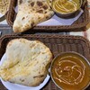 アンナプルナ カレー&ビュッフェ - 手前トマト&生クリームの大海老カレー，奥パンプキンチキンカレー