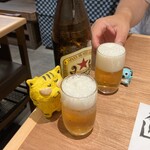 江坂海鮮食堂 はなれ おーうえすと - サッポロ赤星　中瓶　650円（税込）