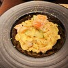 TERRACE & DINING ZERO - 黒いプレートにレモンの皮の黄色が映える～！生タリアテッレを使ったシーフードと夏野菜のレモンクリームソース