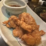 和食 酒肴 まさむら - 大山鶏の唐揚げ。七味の入ったタレを絡めて。