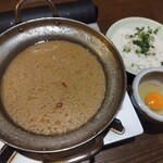 九州料理 二代目もつ鍋わたり - 〆雑炊（ご飯・たまご・ねぎ）600円