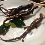 Asadachi - サンショウウオの串焼き