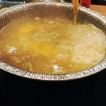 元祖すっぽん地鶏鍋　がんばり家 - 雑炊中