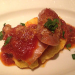 インカント - 豚バラとサリシッチャのトマト煮込み