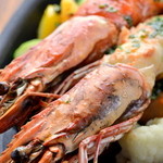 Oven-roasted jumbo shrimp ~herb oil sauce~