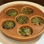 小さなお陽さま - つぶ貝のエスカルゴ風　900円