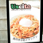 アンディアーモ アッラ ウシータ - 看板