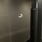 モーモーパラダイス - 店内の喫煙ルーム入口