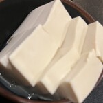 もつ鍋専門店 元祖 もつ鍋 楽天地 - 豆腐もあるよ