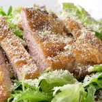 Caesar salad with roasted chicken and plenty of parmesan cheese