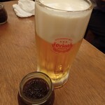 沖縄民謡酒場 わらゆん - オリオンビール中ジョッキ、お通し